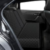 Black quilted waterproof dog car seat cover installed in a vehicle's back seat.