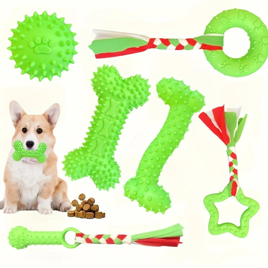 A set of green durable chew toys for puppies, including a ball, bone, and ring shapes.