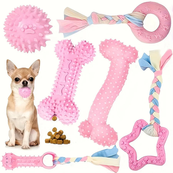 A set of pink and light blue durable chew toys for puppies, including a bone, a large bone shape, and a braided toy.