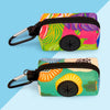 A vibrant pink and green stylish dog poop bag holder with a black strap and clip.