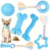 A set of blue and pink durable chew toys for puppies, including a ball, bone, and ring.