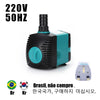 A black and teal submersible water pump with a power cord and a separate adapter is shown against a white background.