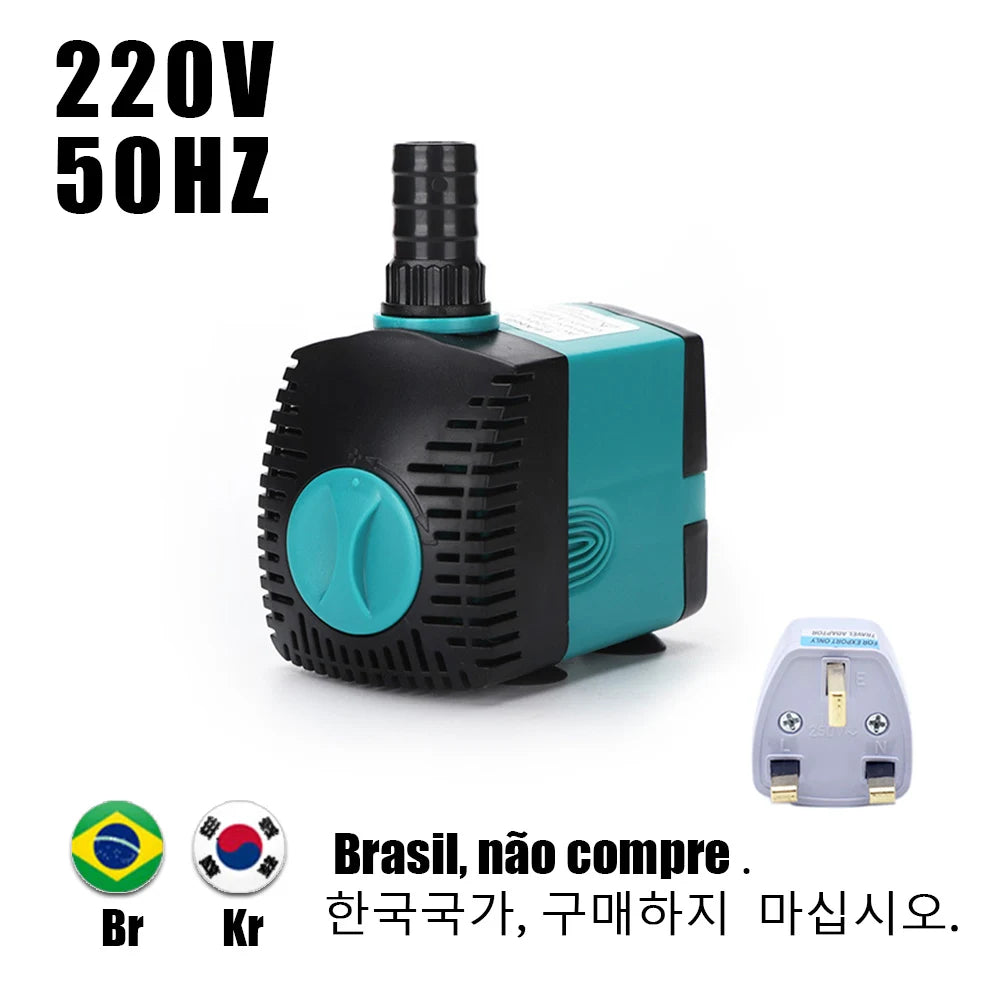 A black and teal submersible water pump with a power cord and a separate adapter is shown against a white background.