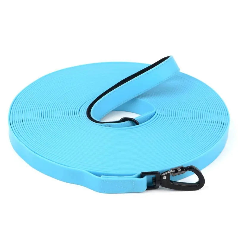 A bright blue waterproof PVC dog training leash with a padded handle and buckle.