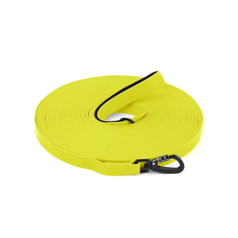 Yellow waterproof PVC dog training leash with a padded handle rolled up.