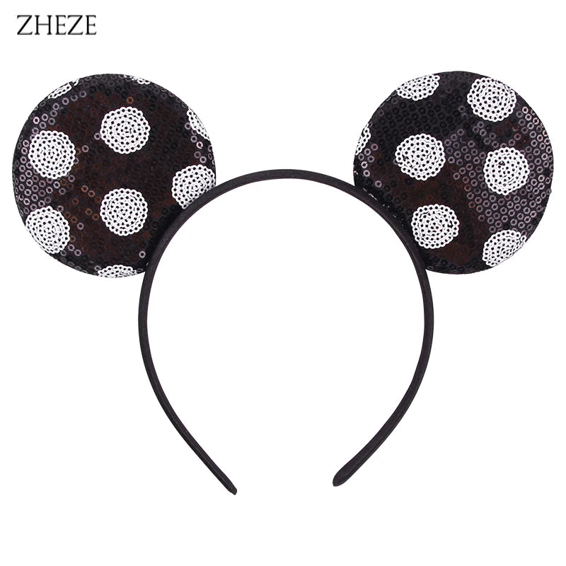 Schmuck-Ohrenband für Mädchen mit schwarz-weiß gepunkteten Pailletten