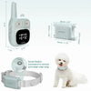 A compact waterproof dog training collar and remote control shown with the collar and a small white dog.