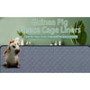 Green fleece cage liners for guinea pigs shown with a small rodent on a gray textured surface.