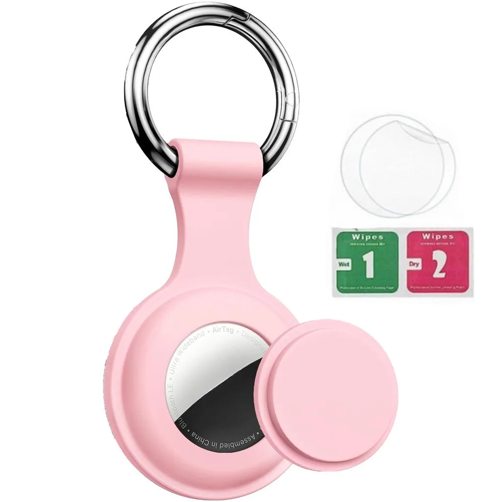 Pink silicone protective cover for an AirTag with a metal keychain ring and cleaning wipes