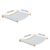A white wall mounted cat hammock and climbing shelf set with wooden supports.