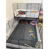 A black wire cage liner with a white base and a removable fleece mat for small pets.