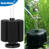 A black aquarium air pump and skimmer filter device with a clear tube, shown in a natural aquatic environment.