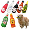 A collection of plush beer bottle dog toys featuring various alcoholic beverages like sparkling rose vodka red wine whiskey a