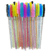 A bundle of colorful disposable eyelash brushes for makeup application