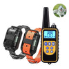 A black electric dog training collar with an orange strap and a digital display is shown against a white background.