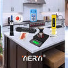 A 4-in-1 digital water quality meter is shown in a kitchen setting with various food items and plants.