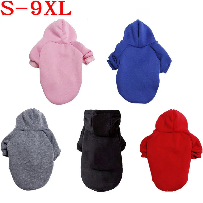 Four colored fleece dog coats or hoodies: pink, blue, gray, and red.