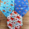 A set of cute cotton pet bandanas featuring various colorful sea creatures and fish designs.