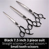 A set of three professional pet grooming scissors including straight, curved, and small tooth scissors.