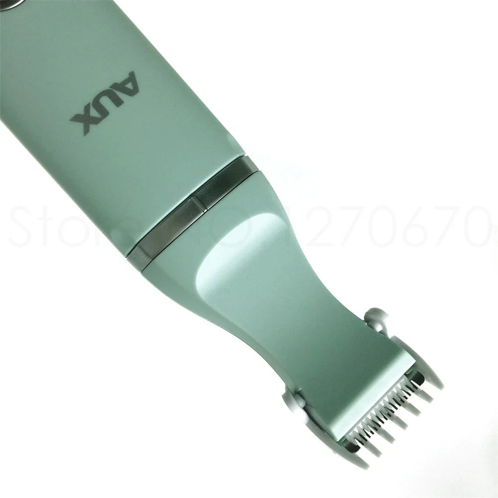 A close-up view of a light green quiet USB rechargeable pet grooming trimmer with a metal guard.