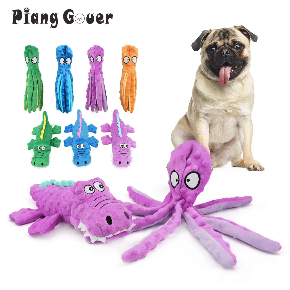 A collection of plush sea turtle toys and a dog toy, including various colored sea turtles and a pug dog.