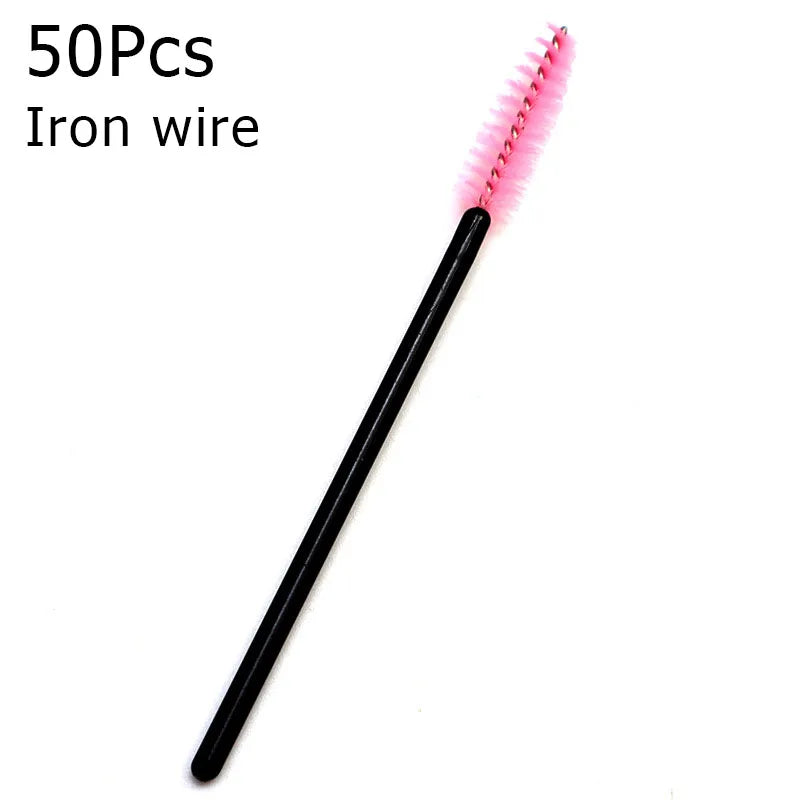 A black iron wire brush with pink bristles is shown against a white background.