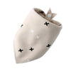 A light beige cotton pet bandana folded and displayed against a white background.