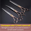 A set of three champagne-colored grooming scissors including straight, curved, and small tooth scissors.