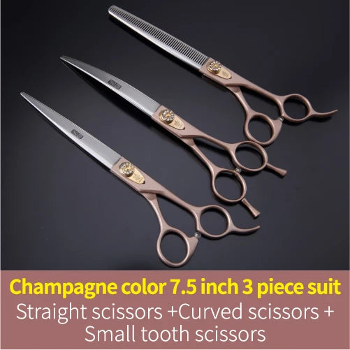 A set of three champagne-colored grooming scissors including straight, curved, and small tooth scissors.