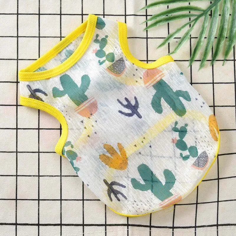 A breathable summer mesh vest for small dogs or cats featuring a pattern of green and yellow cacti on a white background.