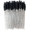 A bundle of disposable eyelash brushes with black and silver bristles.