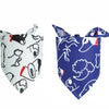 Two pet bandanas featuring cartoon dogs and cats in black and white and blue patterns