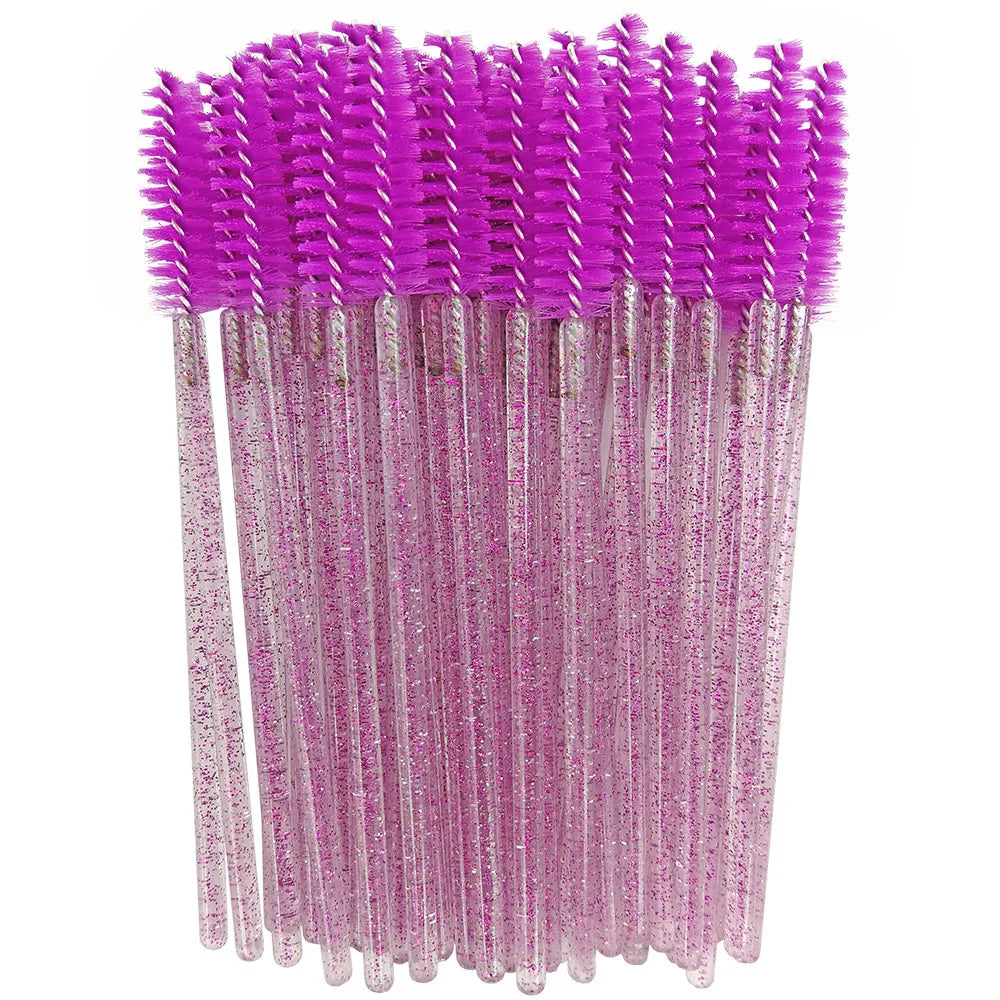 A bundle of disposable eyelash brushes with vibrant purple bristles and clear plastic handles.