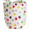 A white cotton pet bandana with colorful paw print patterns for dogs and cats.