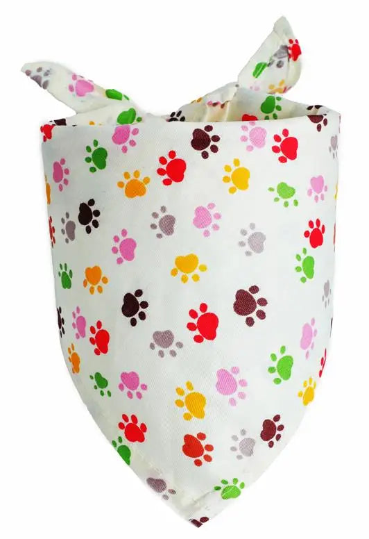 A white cotton pet bandana with colorful paw print patterns for dogs and cats.