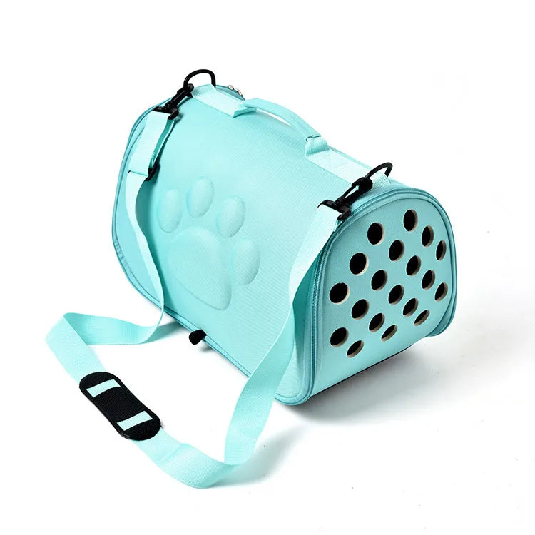 Light blue breathable pet carrier bag for cats and small dogs with a mesh bottom