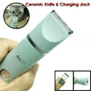 A light green ceramic knife and charging jack grooming trimmer held in a hand, with an inset showing the product details.