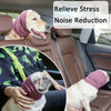 A dog wearing a pink ear muff is shown in a car seat, demonstrating soundproof pet ear muffs for noise reduction.
