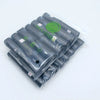 A pack of 14 rolls of black paw print dog waste bags with a dispenser visible in clear plastic packaging.