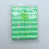 A pack of 14 rolls of green dog waste bags with dispensers is shown in a clear plastic bag.