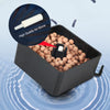 A black container filled with brown bio sponge filter stones and a white air stone, set against a light blue background.