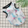 A light gray mesh vest patterned with pink and blue flamingos and hearts, displayed on a grid background.