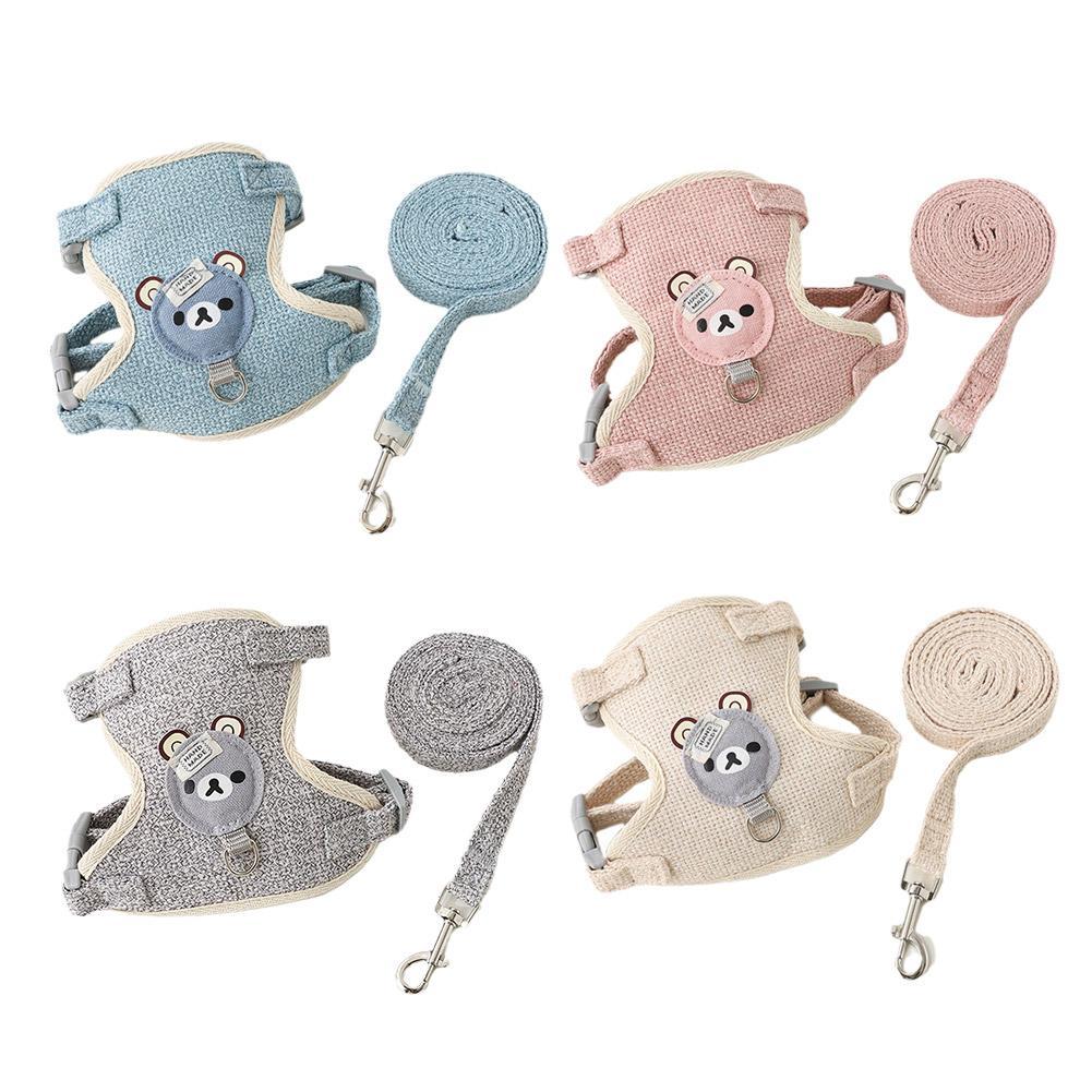 A set of three pink and blue pet leash harnesses for dogs and cats with attached leashes.
