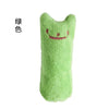 A bright lime green catnip chew toy plush with a smiling face.