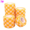 Roll of orange and yellow checkered printed self-adhesive elastic bandage tape