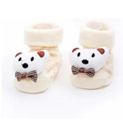 Ein Paar süße Cartoon-Tierbaby-Socken für Kleinkinder in Creme