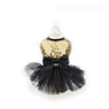 A black and gold sequined princess dog dress displayed on a white mannequin.