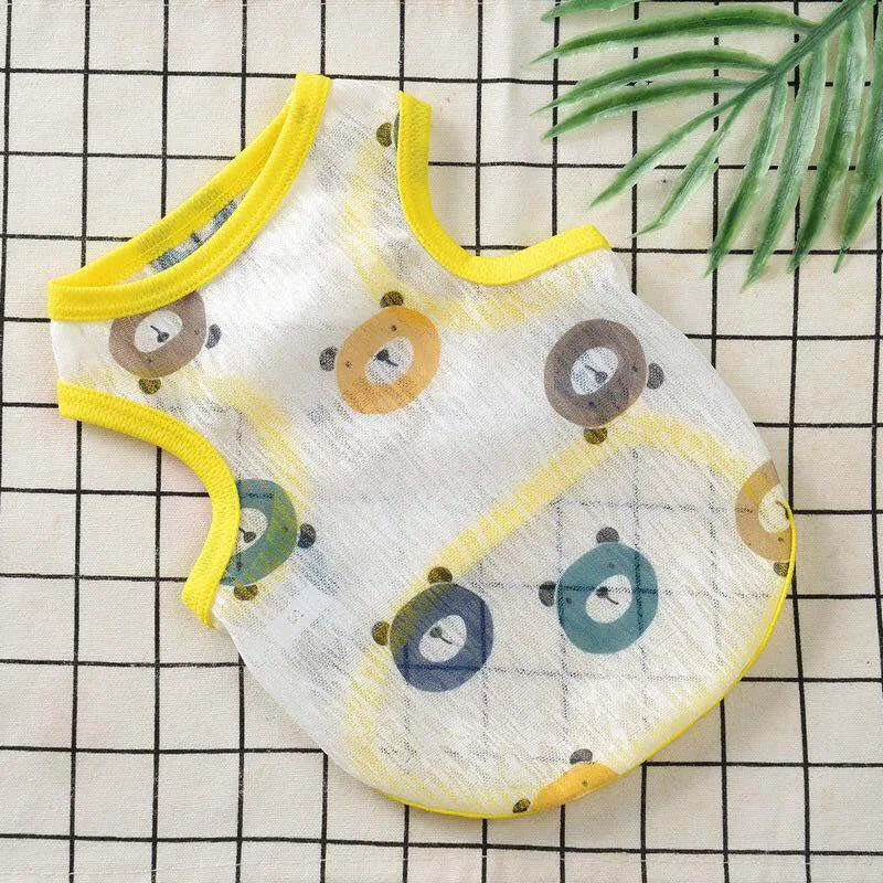 A white mesh vest with yellow trim and patterned designs is shown on a checkered surface.
