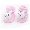 Paar rosa flauschiger Baby-Socken mit weißen Cartoon-Tierfüßen