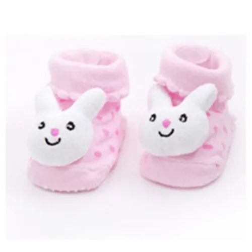 Paar rosa flauschiger Baby-Socken mit weißen Cartoon-Tierfüßen